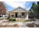 Charming single-story home with a covered front porch, swing, and landscaped front yard at 6192 S Pennsylvania St, Centennial, CO 80121