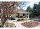 Charming home with a covered front porch, landscaped walkway, and well-maintained yard at 6192 S Pennsylvania St, Centennial, CO 80121
