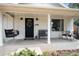 Inviting front porch with a swing, bench, and stylish accents, perfect for relaxing at 6192 S Pennsylvania St, Centennial, CO 80121
