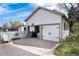 Two-car garage with a finished room, and a fenced yard at 6192 S Pennsylvania St, Centennial, CO 80121