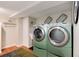 Laundry room with washer and dryer and vinyl flooring at 6192 S Pennsylvania St, Centennial, CO 80121