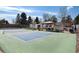Inviting backyard pickleball court with a covered gazebo for entertaining and leisure, surrounded by mature landscaping at 6192 S Pennsylvania St, Centennial, CO 80121