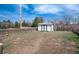 Backyard shed with wooden fence and grass area at 6192 S Pennsylvania St, Centennial, CO 80121