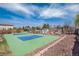 View of the full tennis court in the back yard and playground at 6192 S Pennsylvania St, Centennial, CO 80121