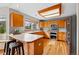Bright kitchen featuring light wood cabinets, stainless steel appliances, and ample countertop space at 9515 Dolton Way, Highlands Ranch, CO 80126