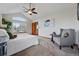 Comfortable main bedroom featuring a high ceiling with a ceiling fan and a great view at 9515 Dolton Way, Highlands Ranch, CO 80126