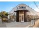 An attractive corner building features the Chook Charcoal Chicken restaurant with outdoor seating at 1332 Ash St, Denver, CO 80220