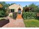 Charming home featuring a beautifully landscaped front yard and eye-catching front entrance with tile steps at 1332 Ash St, Denver, CO 80220