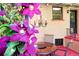 Patio area with a table, chandelier and floral accents at 1332 Ash St, Denver, CO 80220