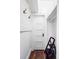 Hallway with a white door and a stepladder, complete with a closet at 4430 Zuni St, Denver, CO 80211