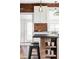 Kitchen with stainless steel appliances, stone countertops, and a breakfast bar at 4430 Zuni St, Denver, CO 80211
