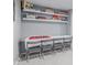 Basement game area with seating for four and shelving for boardgames at 482 W Caley Ave, Littleton, CO 80120