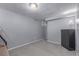 Empty bedroom showing neutral carpet, walls and a dark dresser at 482 W Caley Ave, Littleton, CO 80120