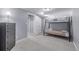 Bedroom with dark dresser and a bunk bed featuring neutral color tones at 482 W Caley Ave, Littleton, CO 80120