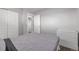 This bedroom has hardwood floors, neutral walls, and a large closet at 482 W Caley Ave, Littleton, CO 80120