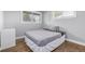 Comfortable bedroom with hardwood floors, a window, and neutral colored walls at 482 W Caley Ave, Littleton, CO 80120