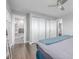 Spacious main bedroom with ensuite bathroom, closet and hardwood floors at 482 W Caley Ave, Littleton, CO 80120