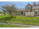 Beautiful backyard with lush green grass and a well-maintained fence at 10239 W Fair Ave # A, Littleton, CO 80127
