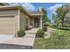 Inviting front porch with seating and manicured landscaping creating curb appeal at 10239 W Fair Ave # A, Littleton, CO 80127