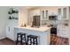 Modern kitchen with stainless steel appliances, ample counter space, and sleek cabinetry at 10239 W Fair Ave # A, Littleton, CO 80127
