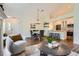 Open-concept living space with dining area and kitchen, perfect for entertaining at 10239 W Fair Ave # A, Littleton, CO 80127