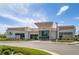 Contemporary Venture Center showcasing modern architecture, lush landscaping, and ample parking at 4670 Tanner Peak Trl, Brighton, CO 80601