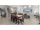 Bright living space with staircase, large windows and modern furnishings at 4670 Tanner Peak Trl, Brighton, CO 80601