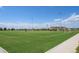 Well-maintained community soccer field, with new artificial turf and lights, offers a great recreational space at 4670 Tanner Peak Trl, Brighton, CO 80601