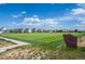 Wide view of the Russ Carr community sports field with well-maintained turf and neighborhood homes visible at 4670 Tanner Peak Trl, Brighton, CO 80601