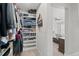 Well-organized walk-in closet with ample shelving and hanging space at 4670 Tanner Peak Trl, Brighton, CO 80601