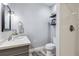 Basement bathroom with toilet and single vanity at 15162 Jakarta Cir, Parker, CO 80134