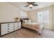 Cozy bedroom with carpeted floor and ceiling fan at 15162 Jakarta Cir, Parker, CO 80134