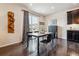 Kitchen dining area with a table for four and access to a deck at 15162 Jakarta Cir, Parker, CO 80134