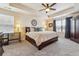 Main bedroom with carpeted floor and large walk-in closet at 15162 Jakarta Cir, Parker, CO 80134