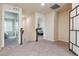 Upstairs hallway with carpeting, doors to bedrooms, and natural light at 15162 Jakarta Cir, Parker, CO 80134