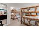 Bedroom featuring unique rustic-style bunk beds at 110 Windwood Cir, Breckenridge, CO 80424