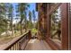 Deck with view of trees at 110 Windwood Cir, Breckenridge, CO 80424