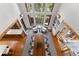 Bright and airy living area with vaulted ceilings, tall windows and outdoor views and unique stair design at 110 Windwood Cir, Breckenridge, CO 80424
