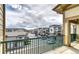 Balcony overlooking the community, with a green railing and a view of the surrounding buildings at 3854 S Dayton Way # 308, Aurora, CO 80014
