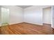 A bedroom with wood floors and a closet with an open door, showing the interior at 3854 S Dayton Way # 308, Aurora, CO 80014