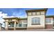 Lovely multi-level condo building with brick accents, siding, large windows, and private balconies at 3854 S Dayton Way # 308, Aurora, CO 80014