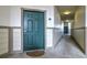 The door to the unit 308 of the building, in the hallway leading to the exit at 3854 S Dayton Way # 308, Aurora, CO 80014