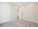 This bedroom features a spacious closet, recessed lighting, and an open doorway to the hall at 5909 S Platte Canyon Dr, Littleton, CO 80123
