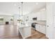 Well-lit kitchen with ample counter space, modern appliances, and an open layout at 5909 S Platte Canyon Dr, Littleton, CO 80123