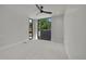 Bright bedroom with a ceiling fan and large windows offering views of the outdoors at 1029 9Th St, Boulder, CO 80302