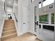 Entryway with a view of the upper level stairs and main level interior at 1029 9Th St, Boulder, CO 80302