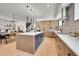 Spacious kitchen featuring an island, modern appliances, cabinetry, and an adjacent dining area at 1029 9Th St, Boulder, CO 80302