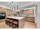 Kitchen with a center island, sleek appliances, modern cabinetry, and stylish pendant lights at 1029 9Th St, Boulder, CO 80302