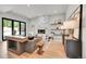 Cozy living area featuring a modern fireplace, stylish decor, and ample natural light at 1029 9Th St, Boulder, CO 80302