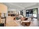 Open-concept living room with modern furniture and light wood floors showcasing a bright and airy atmosphere at 1029 9Th St, Boulder, CO 80302